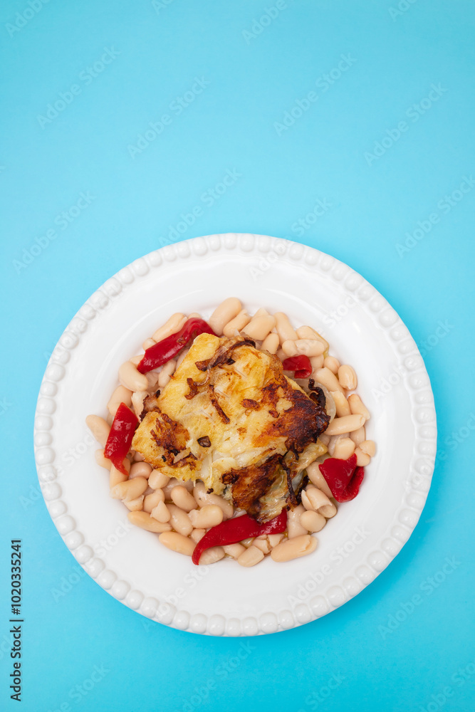 fried cod fish with white beans and grilled red pepper fried cod fish with white beans and grilled red pepper