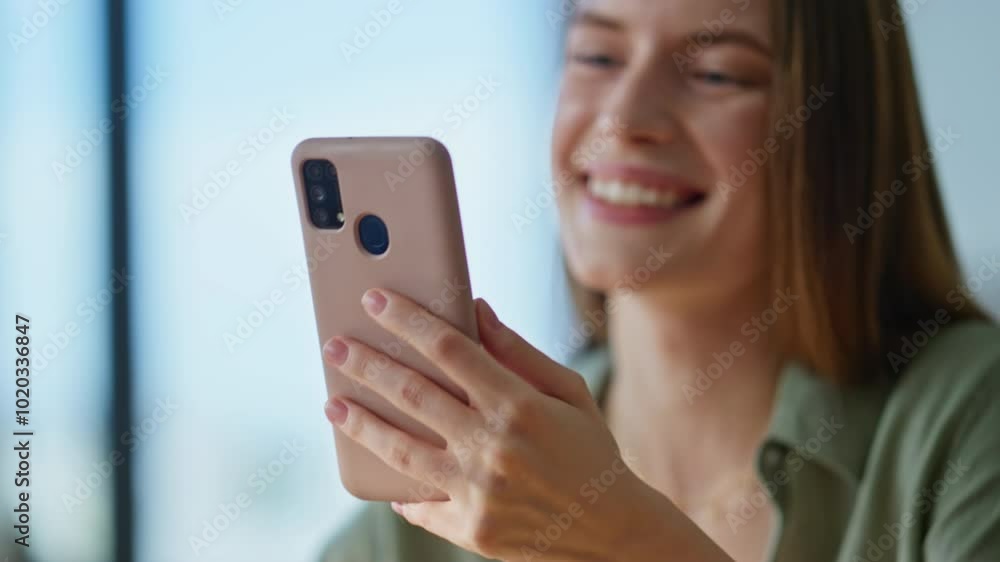 Woman shopping online smartphone choosing purchases closeup. Smiling brunette Woman shopping online smartphone choosing purchases closeup. Smiling brunette