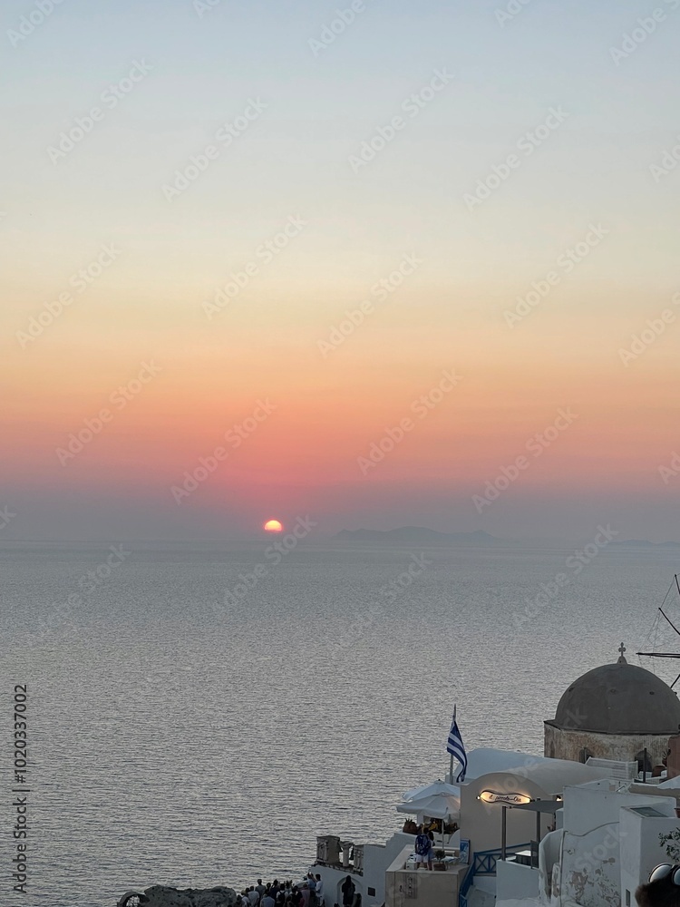 Obraz premium Couchée de soleil spectaculaire sur l'île de santorin