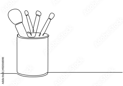 Continuous line drawing of makeup brushes in a box. Illustration for beauty and fashion concepts.