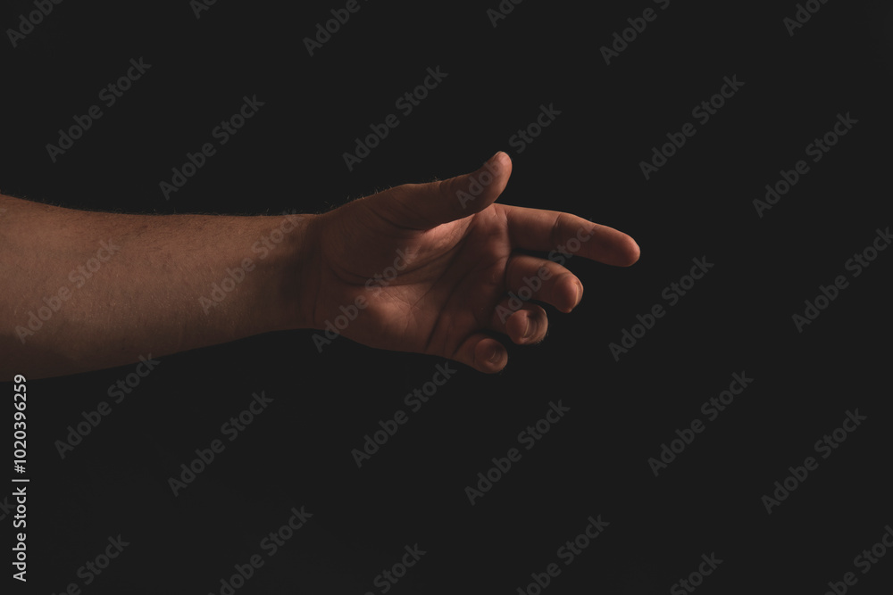 Man hand dark background. Man hand dark. Background. Male. Photo. Model. Finger. Man hand dark background. Man hand dark. Background. Male. Photo. Model. Finger.