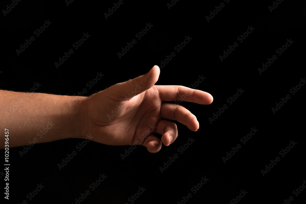 Man hand. Hands. Concept. Photo. Background. Dark. Shadow. Help. Finger. Man hand. Hands. Concept. Photo. Background. Dark. Shadow. Help. Finger.