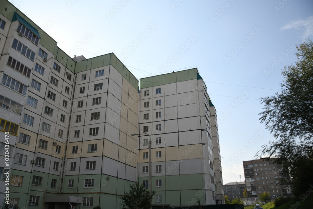 Cityscape of Russia. Panel house of the Soviet Union, old architecture of the building in the brutalism style Cityscape of Russia. Panel house of the Soviet Union, old architecture of the building in the brutalism style