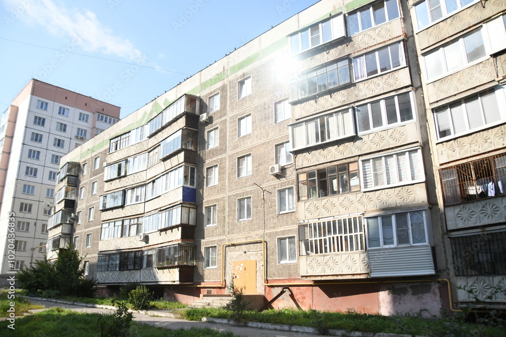 Cityscape of Russia. Panel house of the Soviet Union, old architecture of the building in the brutalism style Cityscape of Russia. Panel house of the Soviet Union, old architecture of the building in the brutalism style