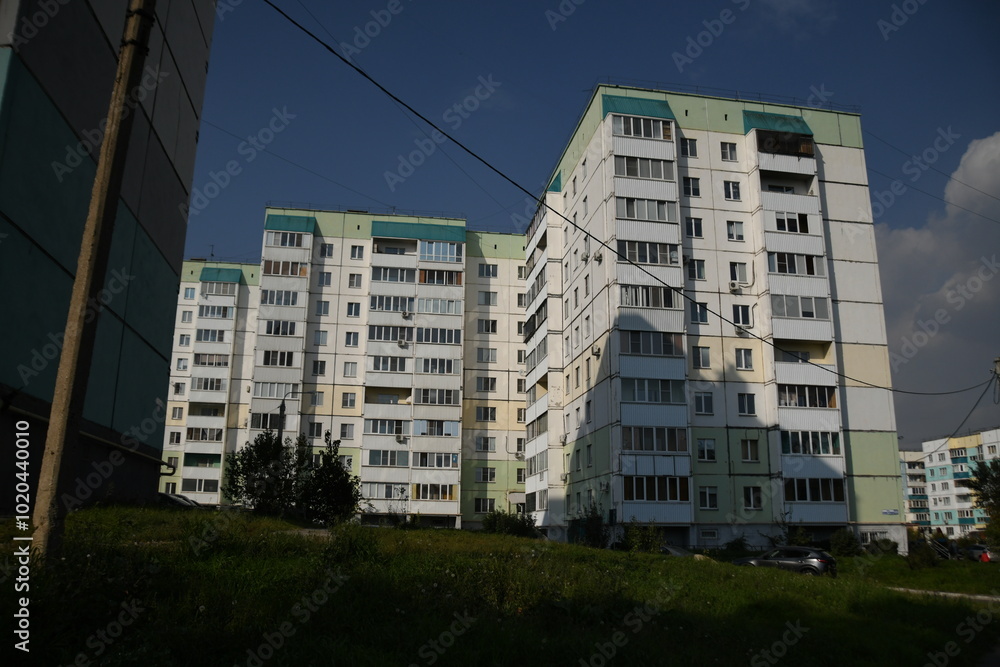 Cityscape of Russia. Panel house of the Soviet Union, old architecture of the building in the brutalism style Cityscape of Russia. Panel house of the Soviet Union, old architecture of the building in the brutalism style