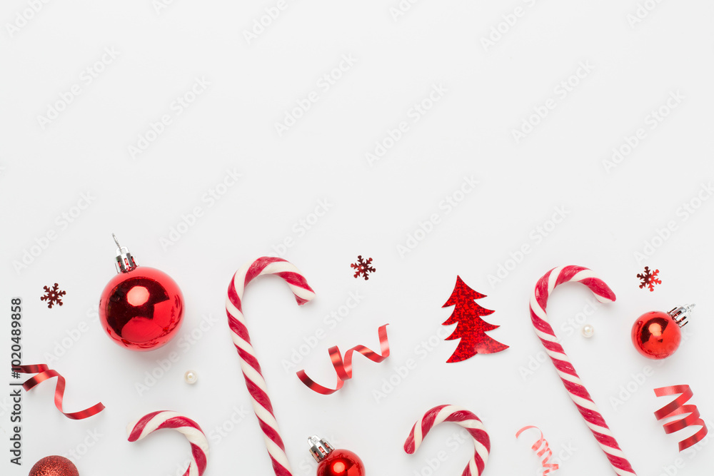 Christmas composition with lollipops on color background, top view Christmas composition with lollipops on color background, top view