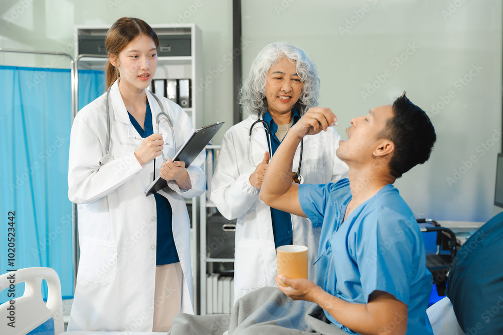 Doctor talking with man patient for monitoring and check up after surgery. doctor touching patient hand and consoling. Doctor talking with man patient for monitoring and check up after surgery. doctor touching patient hand and consoling.