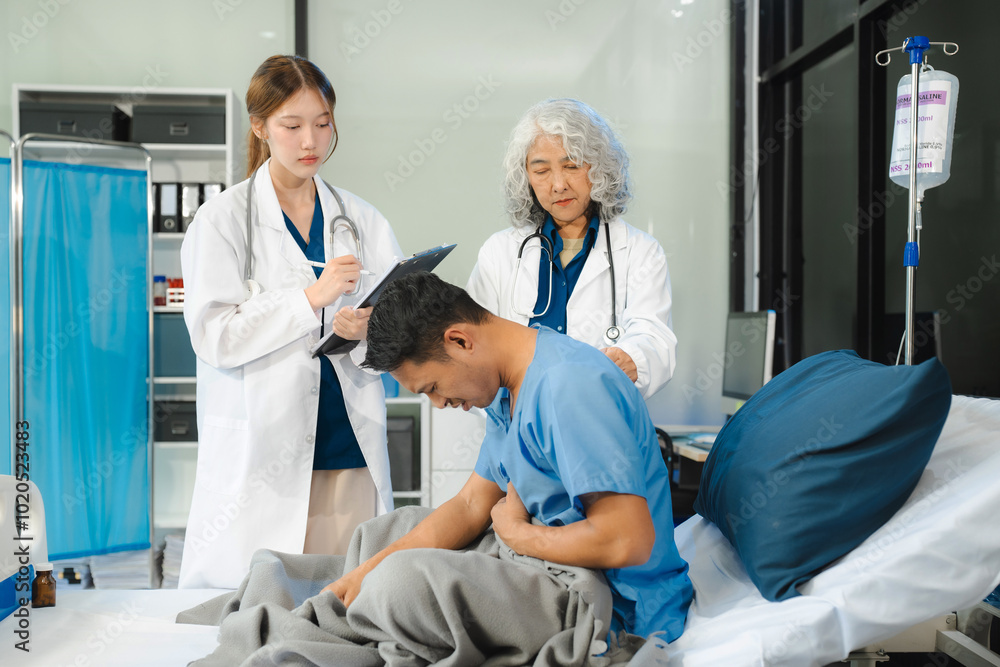 Fototapeta premium Doctor talking with man patient for monitoring and check up after surgery. doctor touching patient hand and consoling.