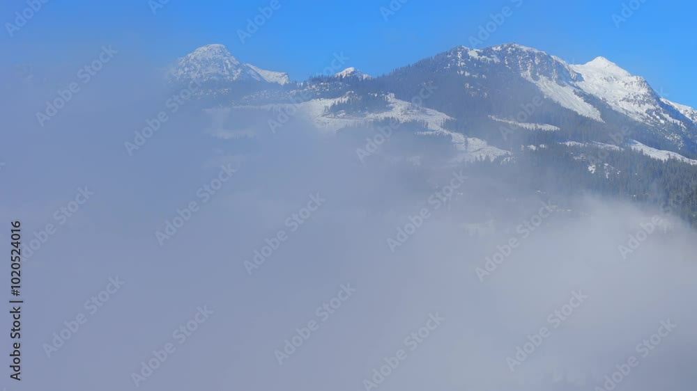 Aerial view on Canadian rocky mountain landscape covered in snow Aerial view on Canadian rocky mountain landscape covered in snow