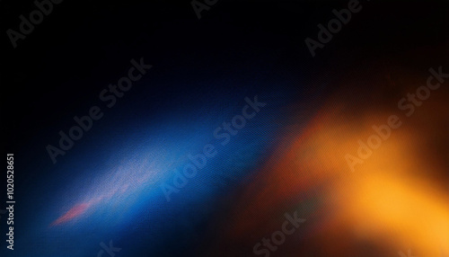 Defocused blue yellow orange radiance soft texture on dark black abstract empty space background. Neon blur glow. Color light overlay. Copy space.