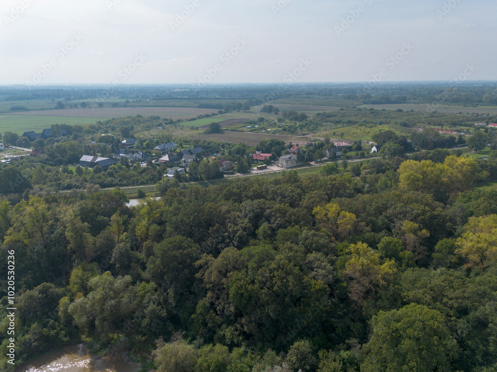 Autumn landscape of forest with field and city. View from above. Autumn landscape of forest with field and city. View from above.