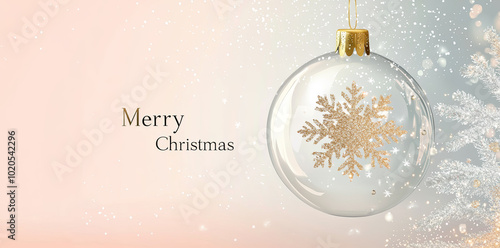 Christmas gretting card background with snow globe containing golden snowflake and falling snow against a blue background and bokeh photo