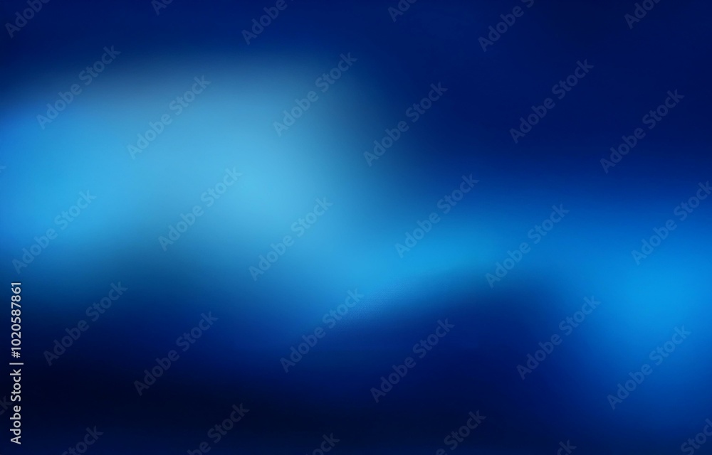 Obraz premium A blurred gradient background fades from light blue to dark blue.