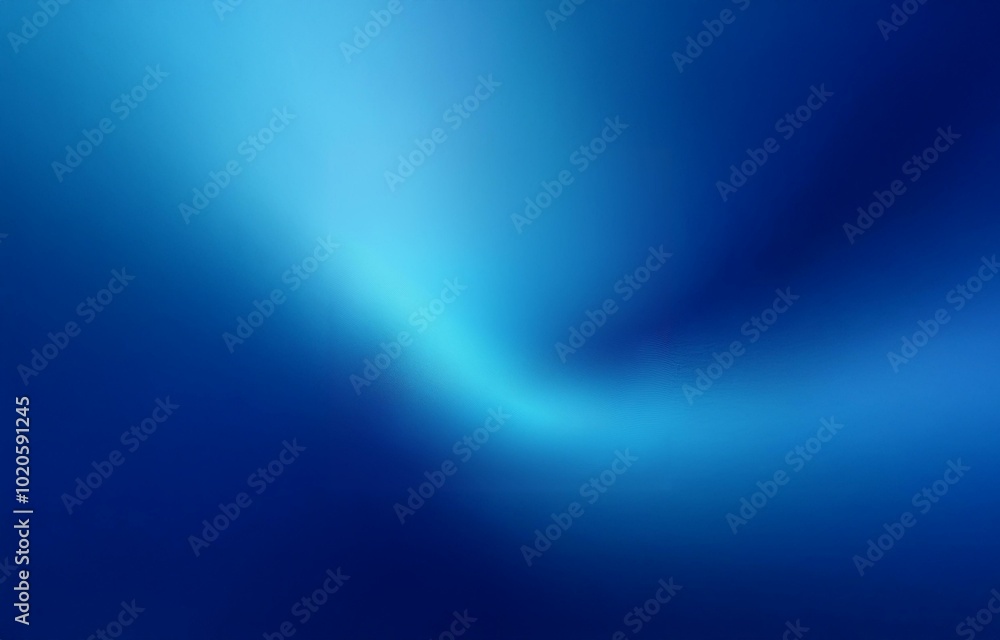 Fototapeta premium A gradient blue background with a subtle white light in the middle.