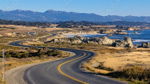 Winding Coastal Road with Mountain Views and Ocean