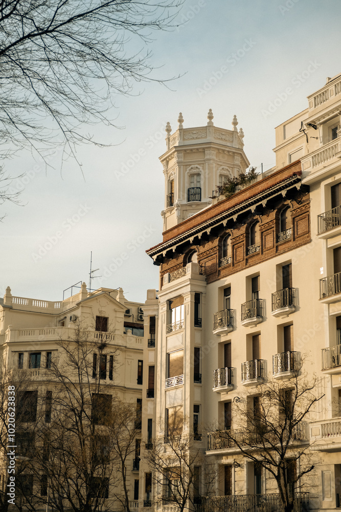 Fototapeta premium Vintage Spanish architecture. Facade of old residential building in downtown of Madrid