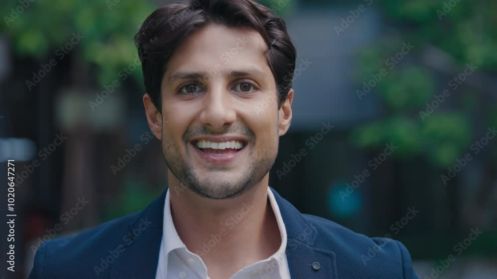 Young Coach Smiling at the Camera while Standing on the Street. Young Coach Smiling at the Camera while Standing on the Street.