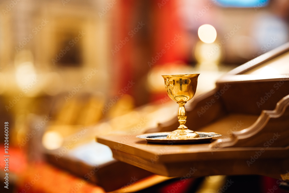 Communion goblet on table in church. special vessel in Orthodox Church Communion goblet on table in church. special vessel in Orthodox Church