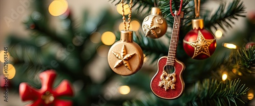 Festive Christmas Ornaments Adorning Evergreen Tree Branch with Golden Lights photo