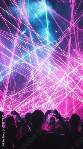 Wallpaper Mural A vibrant concert atmosphere filled with colorful laser lights and an excited crowd enjoying the electrifying performance. Torontodigital.ca
