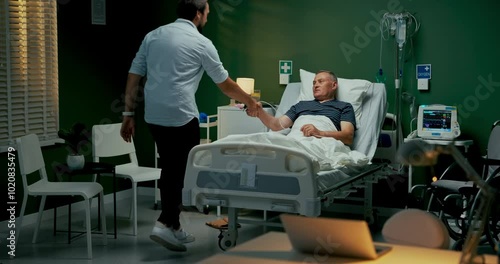 Son visit the hospital, bringing capture moments with their grandfather.