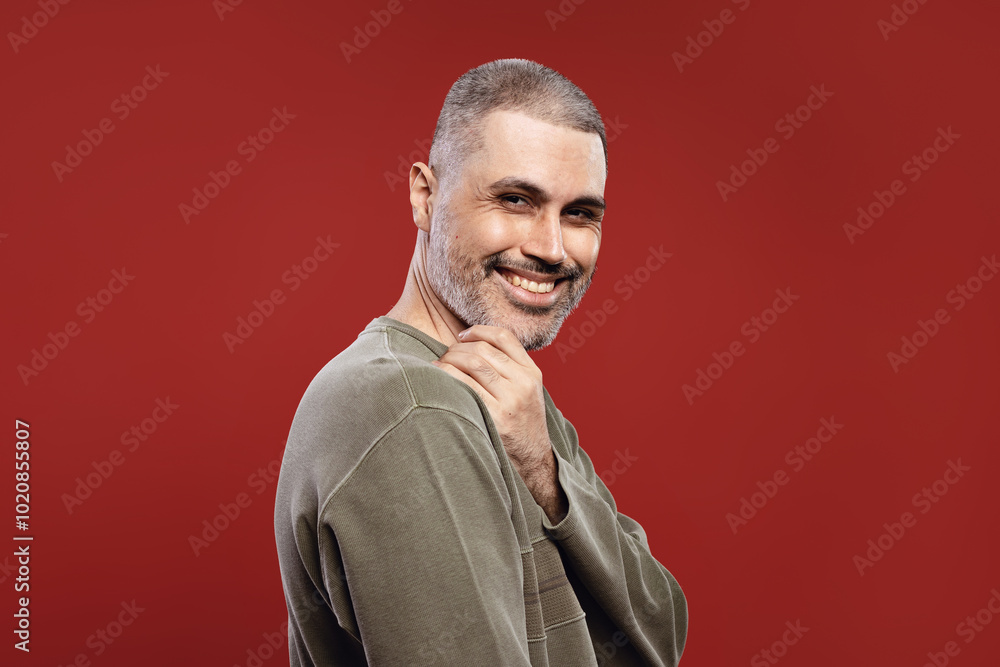 man in profile smiling with hand on chin man in profile smiling with hand on chin