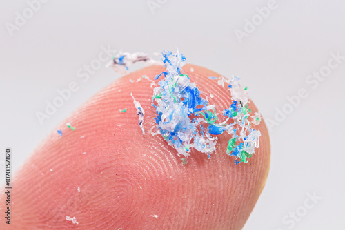 finger close-up with traces of plastic and microplastic
