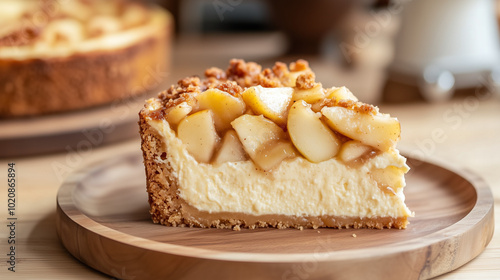 Wallpaper Mural A slice of apple crumble cheesecake with a creamy, soft texture and caramelized apples on top, served on a wooden plate Torontodigital.ca