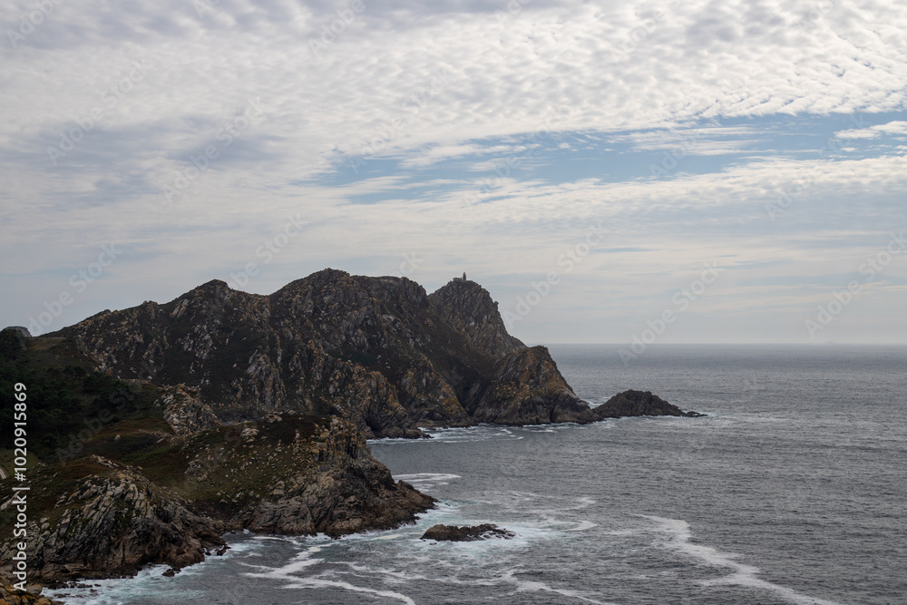 Image Description: Dramatic coastal landscape with rugged cliffs, crashing waves, and a cloudy sky. Perfect for projects related to nature, travel, or adventure. Image Description: Dramatic coastal landscape with rugged cliffs, crashing waves, and a cloudy sky. Perfect for projects related to nature, travel, or adventure.