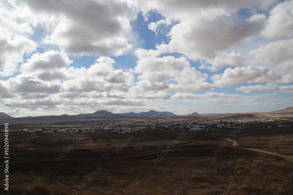 desertic landscape of volcano and caldera on the sea side desertic landscape of volcano and caldera on the sea side