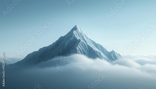 Majestic mountain peak emerging from soft clouds against a serene blue sky.