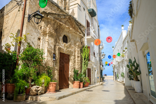 Monopoli, Puglia, Italy - Street and alley with a view of colorful houses in the old town. A region of Apulia