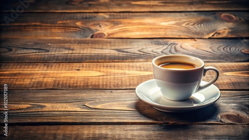 A steaming cup of coffee sits on a rustic wooden table, inviting a moment of calm and contemplation.