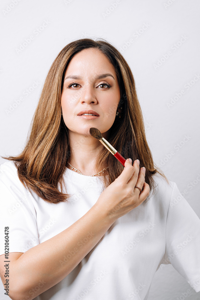 portrait of makeup artist on white background