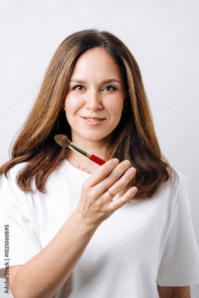 portrait of makeup artist on white background