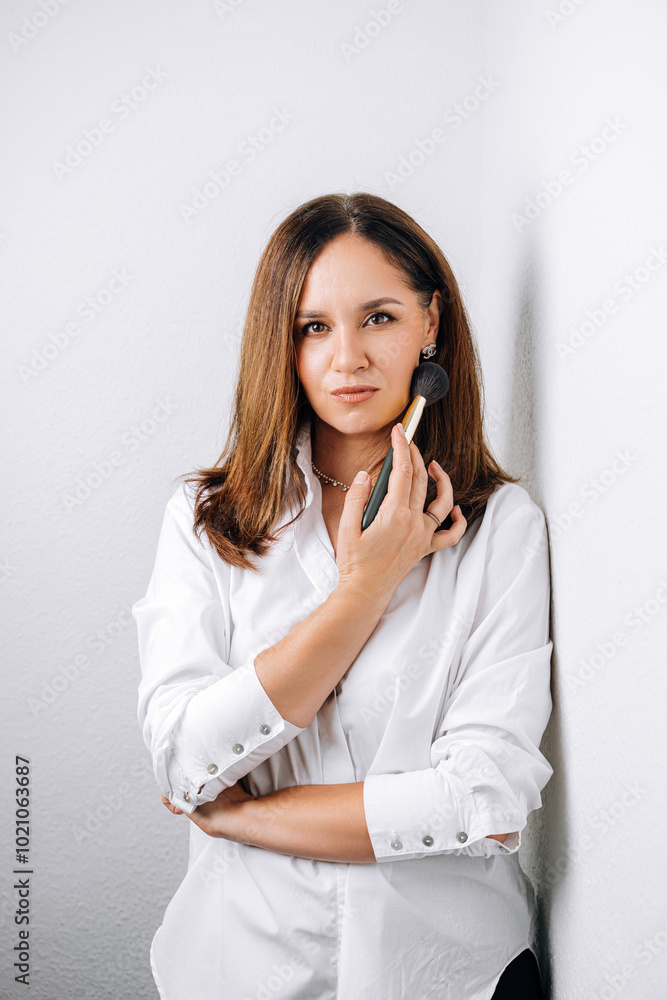 portrait of makeup artist on white background