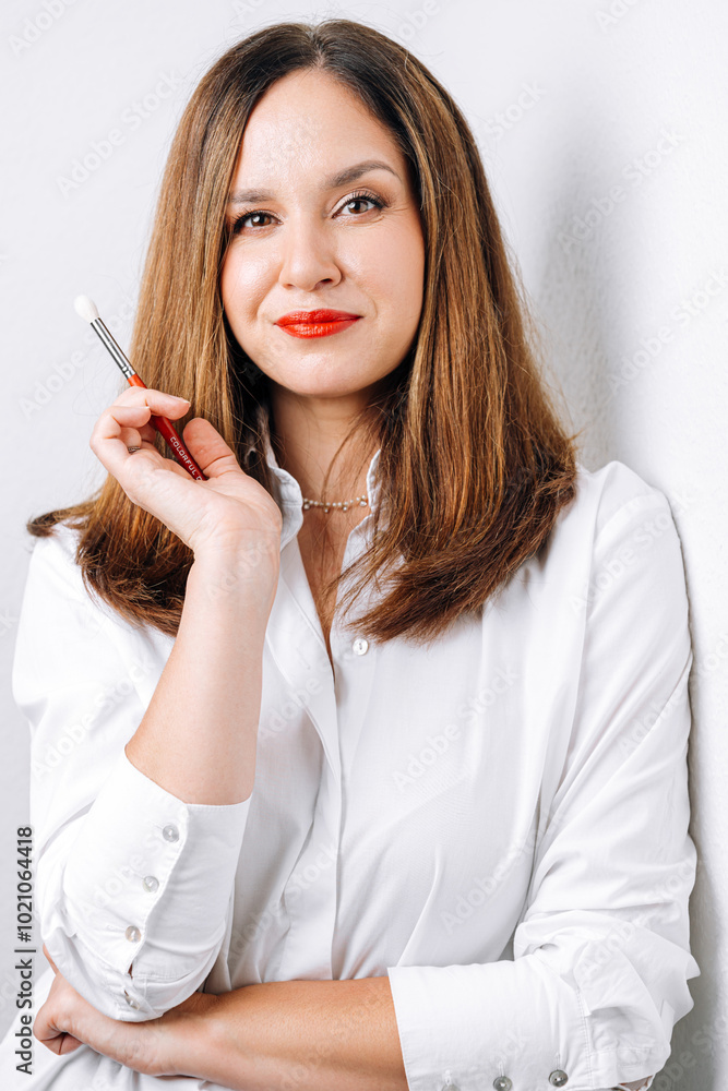 portrait of makeup artist on white background