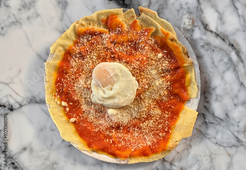Foto pani fratau o vratau - typical Sardinian first course with pane carasau, tomato,