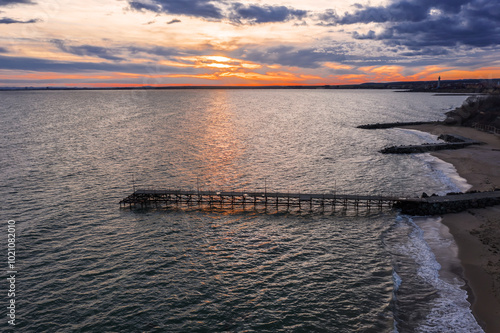 Aerial view of sunset over the beach	in sea resort Ravda, Burgas, Bulgaria photo