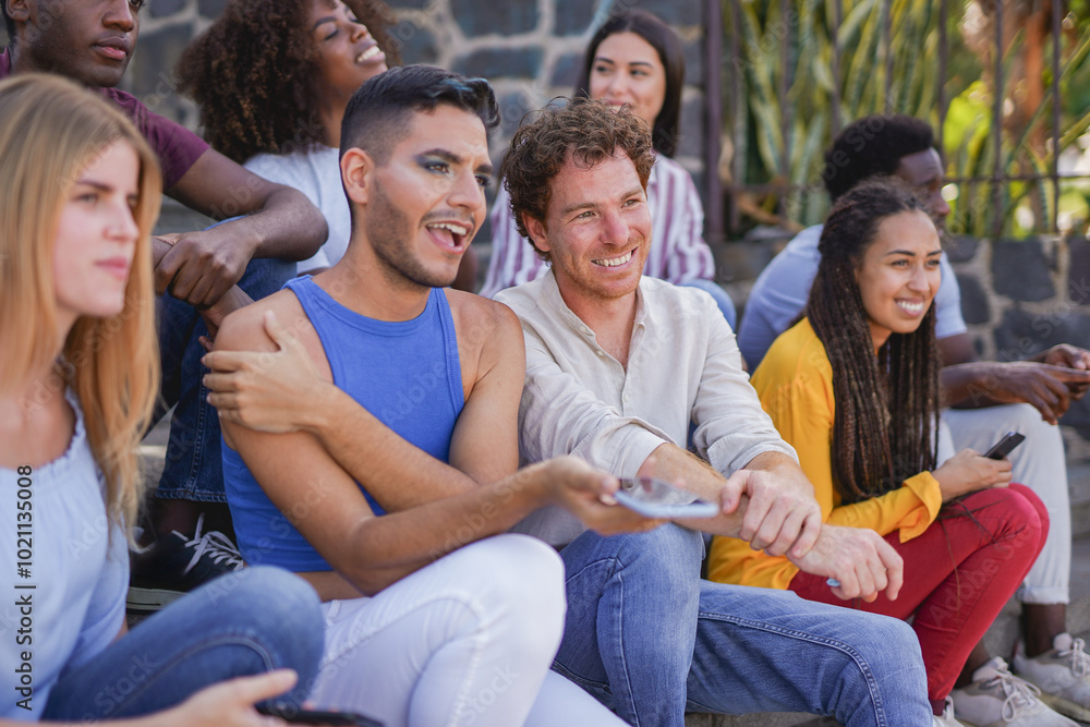Happy multiracial people smiling in front of camera - Group of diverse friends having fun together in the city - Focus on brown hair boy Happy multiracial people smiling in front of camera - Group of diverse friends having fun together in the city - Focus on brown hair boy