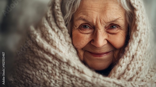 Smiling elderly woman in a cozy knit sweater, her wrinkled face radiating warmth and kindness, soft natural light