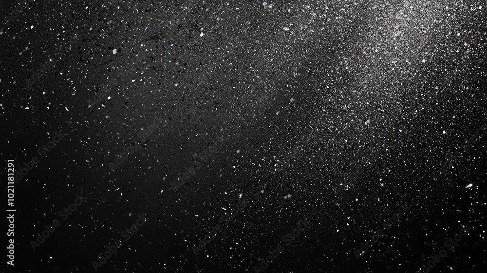 Obraz premium A mesmerizing abstract image featuring a myriad of white particles against a dark background, creating a sense of depth and motion.