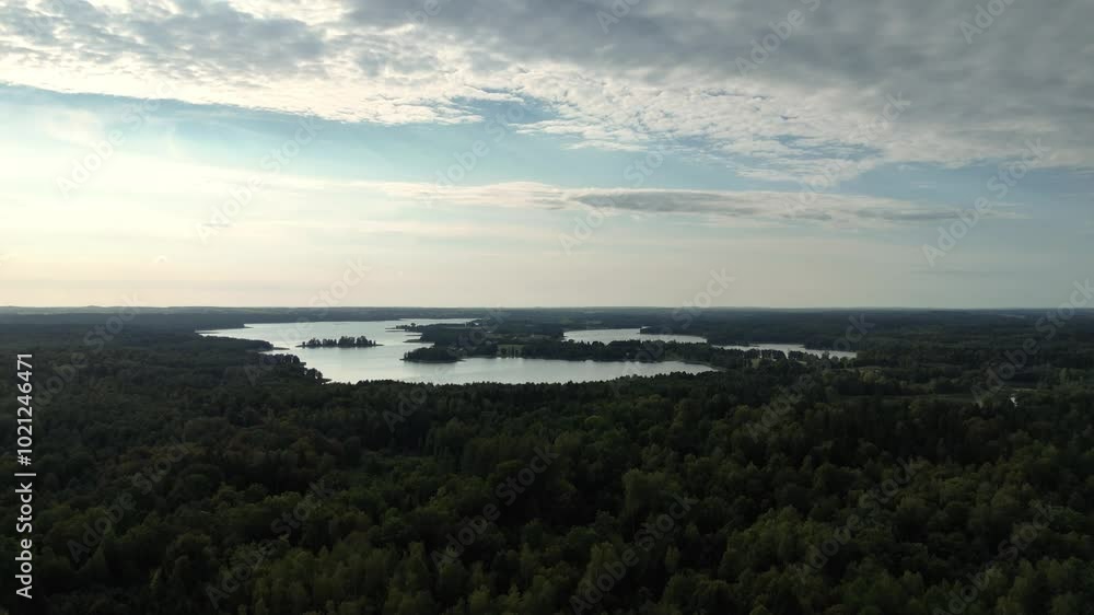 Aerial view of lakes and forests. A breathtaking drone view of serene lakes surrounded by lush green forests, capturing the peaceful beauty of nature from above. Aerial view of lakes and forests. A breathtaking drone view of serene lakes surrounded by lush green forests, capturing the peaceful beauty of nature from above.
