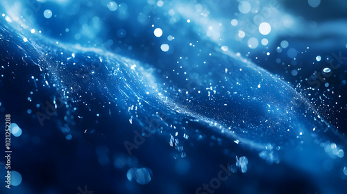 Abstract Blue Background with Glowing Particles