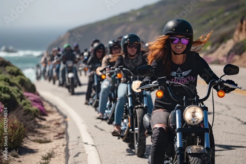 Group of female bikers on a coastal road celebrating International Female Ride Day