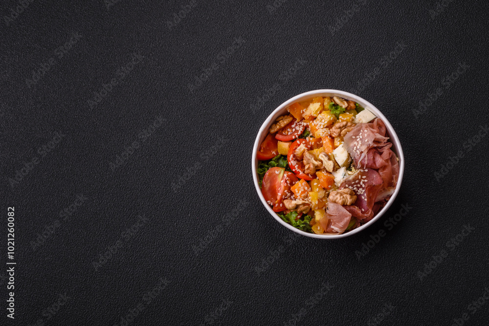 Appetizing salad with prosciutto, pumpkin, cheese and tomatoes Appetizing salad with prosciutto, pumpkin, cheese and tomatoes