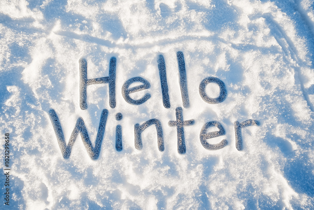 Hello Winter lettering on snow and ice. Festive winter season concept. Christmas and New Year holidays, enjoying winter weather, morning sport outdoors Hello Winter lettering on snow and ice. Festive winter season concept. Christmas and New Year holidays, enjoying winter weather, morning sport outdoors