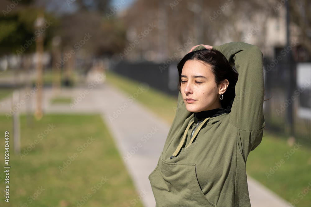 Young woman doing stretching exercise Young woman doing stretching exercise