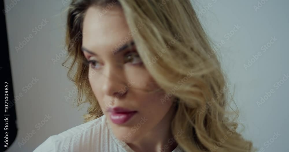 Community manager concept: A model strikes a pose while being captured on a smartphone, blending the art of photography with modern technology to create an intimate and spontaneous moment of beauty. 
