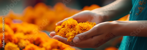 A woman gently lights an oil lamp in the heart of a beautifully designed Rangoli, surrounded by vibrant flowers and glowing candles, celebrating the spirit of Diwali.